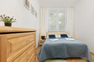 Łóżko lub łóżka w pokoju w obiekcie Bałuckiego Apartment Stary Mokotów Warsaw by Noclegi Renters