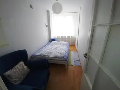 Łóżko lub łóżka w pokoju w obiekcie Apartament Saski
