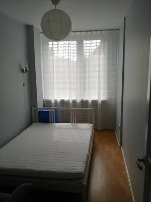 Łóżko lub łóżka w pokoju w obiekcie Apartament Saski