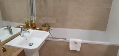 Łazienka w obiekcie Apartament VARSOVIA 403