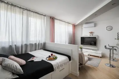 Telewizja i/lub zestaw kina domowego w obiekcie Air-conditioned Premium Loft Warsaw Skyline only 900 m to Central Station