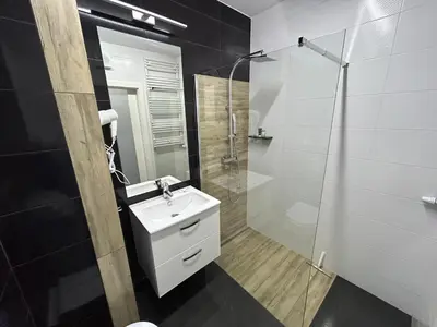 Łazienka w obiekcie Poland Apartment 8