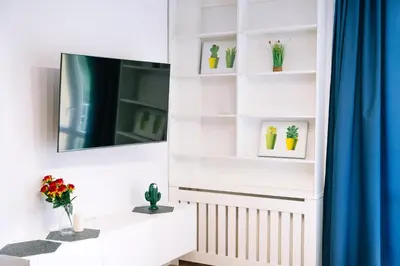 Telewizja i/lub zestaw kina domowego w obiekcie Warsaw Studio Apartment - City View, Parks nearby by Rentujemy