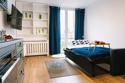 Łóżko lub łóżka w pokoju w obiekcie Warsaw Studio Apartment - City View, Parks nearby by Rentujemy