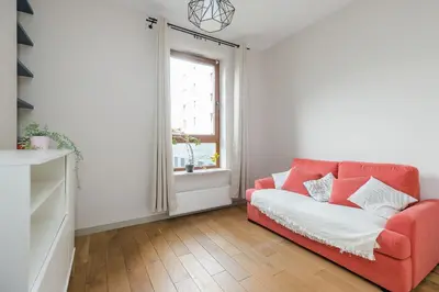 Łóżko lub łóżka w pokoju w obiekcie ShortStayPoland Rydygiera (B128)