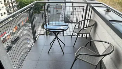 Balkon lub taras w obiekcie Sun apartment on Wola