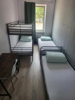 Łóżko lub łóżka w pokoju w obiekcie Rooms4Rest Wiertnicza - Private rooms for tourists