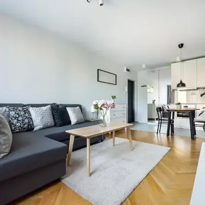 Nowogrodzka Grey Apartment by BookingHost
