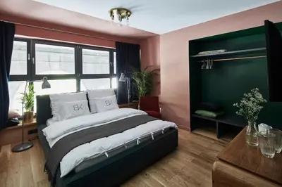 Łóżko lub łóżka w pokoju w obiekcie Bez Kantów Art Rooms