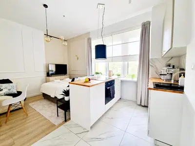 Kuchnia lub aneks kuchenny w obiekcie J&W Apartments Grójecka Glam Flat