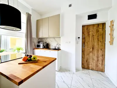 Kuchnia lub aneks kuchenny w obiekcie J&W Apartments Grójecka Glam Flat