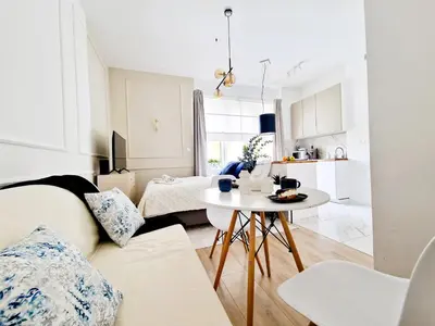 Łóżko lub łóżka w pokoju w obiekcie J&W Apartments Grójecka Glam Flat