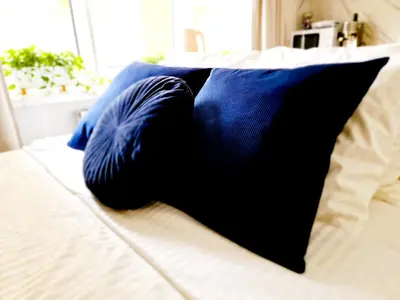 Łóżko lub łóżka w pokoju w obiekcie J&W Apartments Grójecka Glam Flat