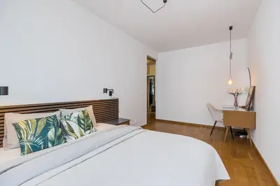 Łóżko lub łóżka w pokoju w obiekcie Lanciego - przytulny Apartament z osobną sypialną, Balkon, WI-FI, Natolin, Ursynów