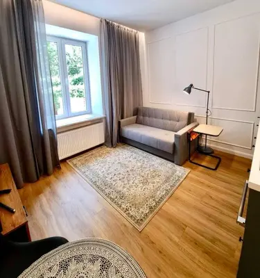 Łóżko lub łóżka w pokoju w obiekcie Old Ochota Prime Studio