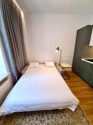 Łóżko lub łóżka w pokoju w obiekcie Old Ochota Prime Studio