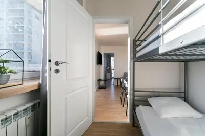 Łóżko lub łóżka w pokoju w obiekcie Warsaw Concierge Pańska 61