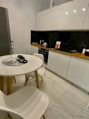 Kuchnia lub aneks kuchenny w obiekcie Apartment Mokotów blisko lotniska Chopina
