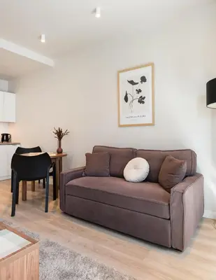 Część wypoczynkowa w obiekcie Magazynowa Classy Apartment by BookingHost