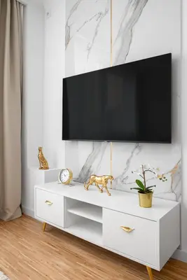 Telewizja i/lub zestaw kina domowego w obiekcie Glam & Modern by Cooee Apartments