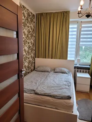 Łóżko lub łóżka w pokoju w obiekcie Apartament Boni