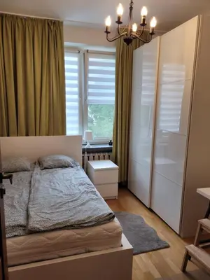 Łóżko lub łóżka w pokoju w obiekcie Apartament Boni