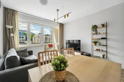 Telewizja i/lub zestaw kina domowego w obiekcie Powiśle Business Apartments - Balcony, Workspace - by Rentujemy