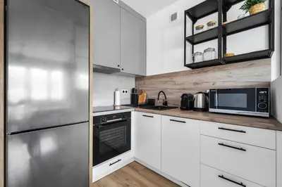 Kuchnia lub aneks kuchenny w obiekcie Powiśle Business Apartments - Balcony, Workspace - by Rentujemy