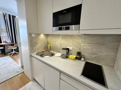 Kuchnia lub aneks kuchenny w obiekcie DECOR 4 fast WiFi 85'TV Netflix HBO Disney+