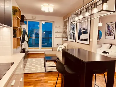 Telewizja i/lub zestaw kina domowego w obiekcie Jardin Apartment Ursynów