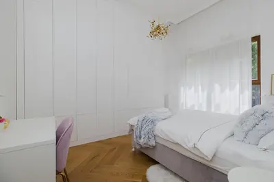 Łóżko lub łóżka w pokoju w obiekcie Woronicza Premium- Margo Apart