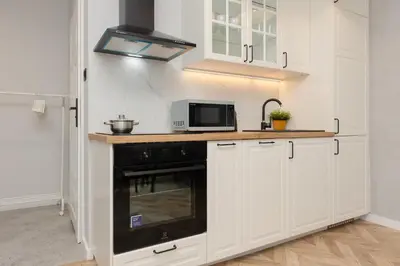 Kuchnia lub aneks kuchenny w obiekcie Twilight Apartment for 3 Guests Warsaw Wola by Noclegi Renters