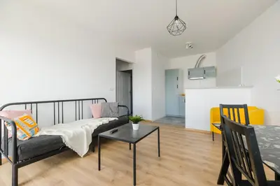 Łóżko lub łóżka w pokoju w obiekcie ShortStayPoland Jana Olbrachta (B40)