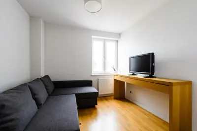 Telewizja i/lub zestaw kina domowego w obiekcie Apartament 100m2 - 2 sypialnie, 2 łazienki, salon, kuchnia, taras, WiFi, rowery