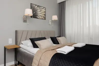Łóżko lub łóżka w pokoju w obiekcie Stunning Family Apartment Ursynów with Parking & Balcony by Noclegi Renters