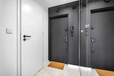 Łóżko lub łóżka w pokoju w obiekcie Park Sady Żoliborskie Modern Apartment by BookingHost