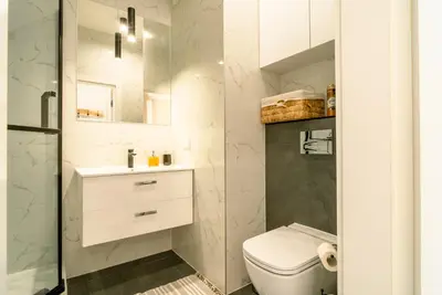 Łazienka w obiekcie ApartamentySnu, Wola Premium II z parkingiem