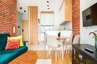Kuchnia lub aneks kuchenny w obiekcie ApartamentySnu, Wola Premium II z parkingiem