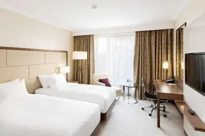 Łóżko lub łóżka w pokoju w obiekcie DoubleTree by Hilton Hotel & Conference Centre Warsaw
