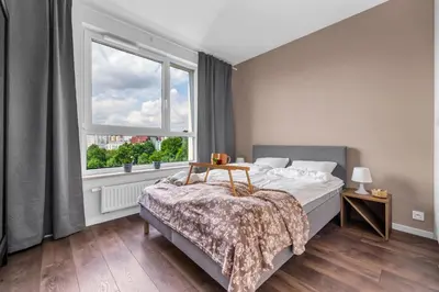 Łóżko lub łóżka w pokoju w obiekcie Galeria Północna Apt - 45m2, Parking, Balcony - by Rentujemy