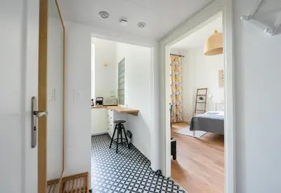Łóżko lub łóżka w pokoju w obiekcie Wolność City Centre Comfy Studio by BookingHost