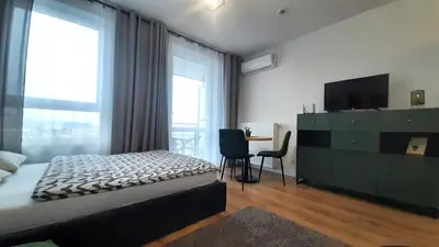 Łóżko lub łóżka w pokoju w obiekcie Apartament Venus