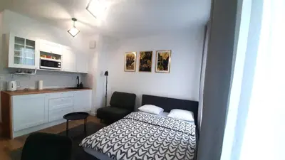 Łóżko lub łóżka w pokoju w obiekcie Apartament Venus