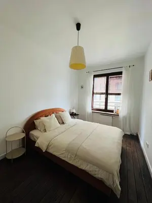 Łóżko lub łóżka w pokoju w obiekcie Murano Pokorna Apartment