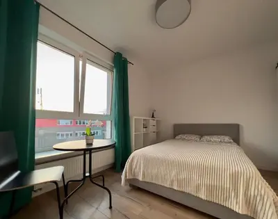 Łóżko lub łóżka w pokoju w obiekcie K22 Large Family Apart Komputerowa