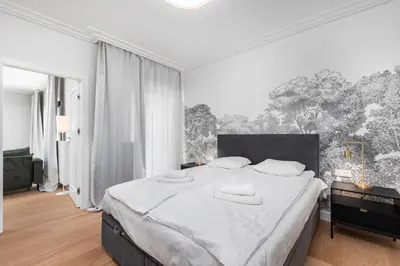 Łóżko lub łóżka w pokoju w obiekcie Szwedzka 22B by Homeprime