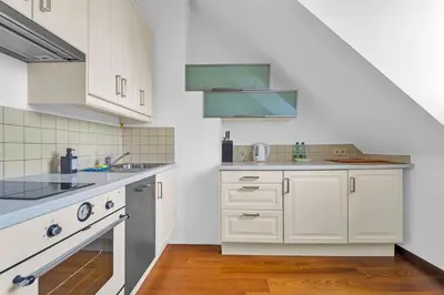 Kuchnia lub aneks kuchenny w obiekcie Rynek Nowego Miasta Two-Level Apartment by BookingHost