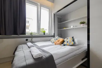 Łóżko lub łóżka w pokoju w obiekcie ShortStayPoland Kaliska (B132)