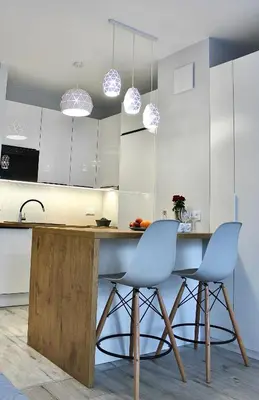 Kuchnia lub aneks kuchenny w obiekcie LuxApartmentWarszawa z bezpłatnym podziemnym parkingem