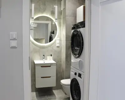 Łazienka w obiekcie LuxApartmentWarszawa z bezpłatnym podziemnym parkingem